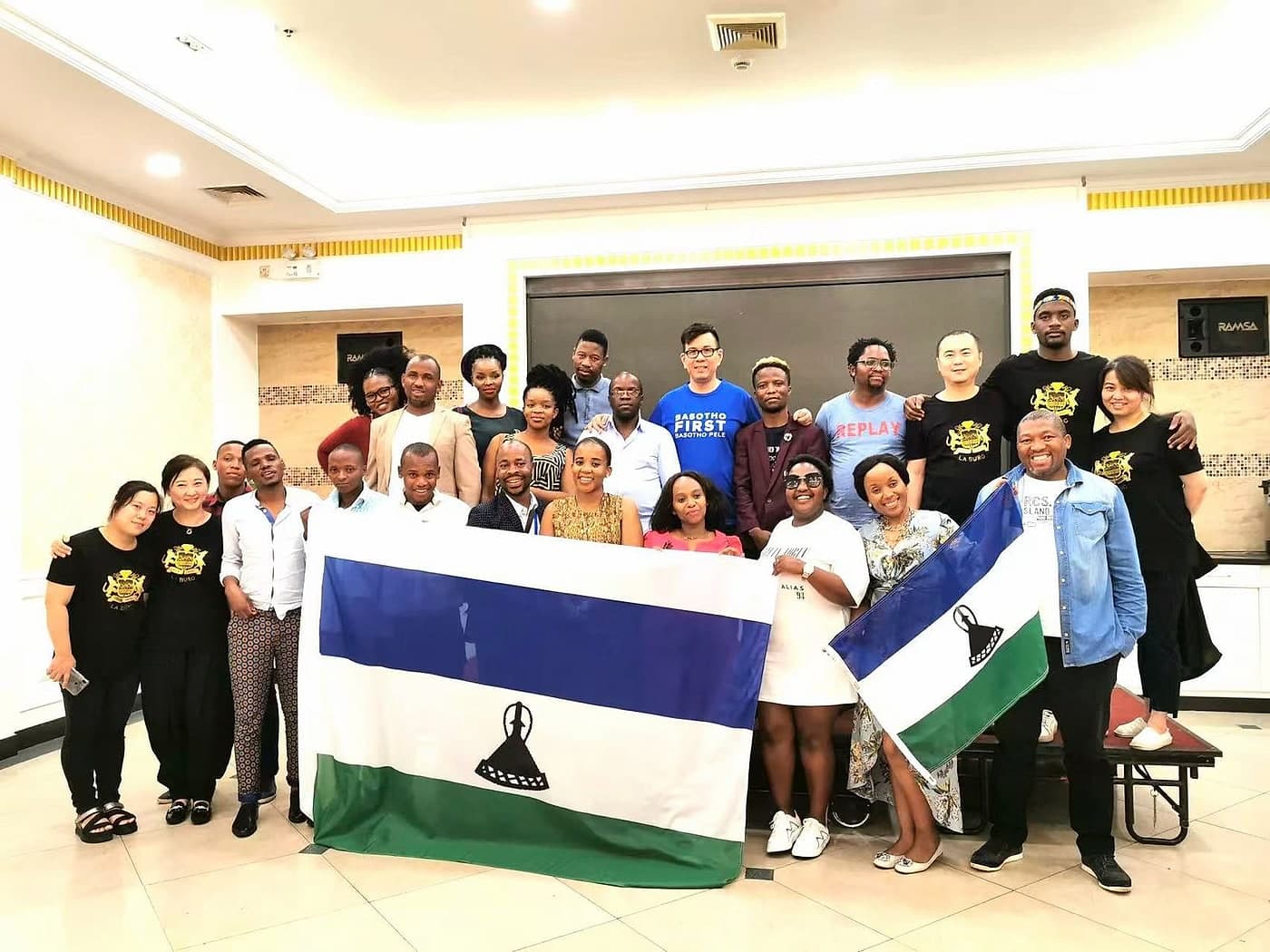 Basotho Pele supporters with the Lesotho flag