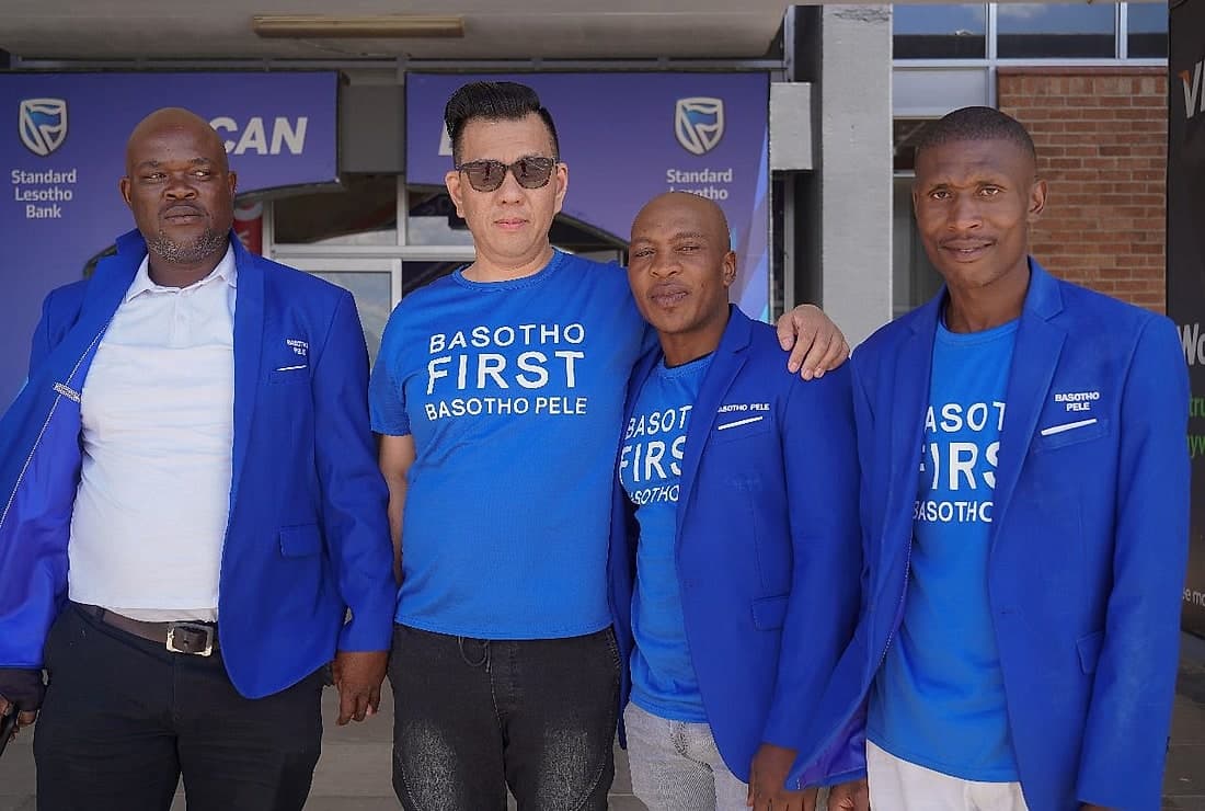 Basotho Pele team members in blue campaign clothing